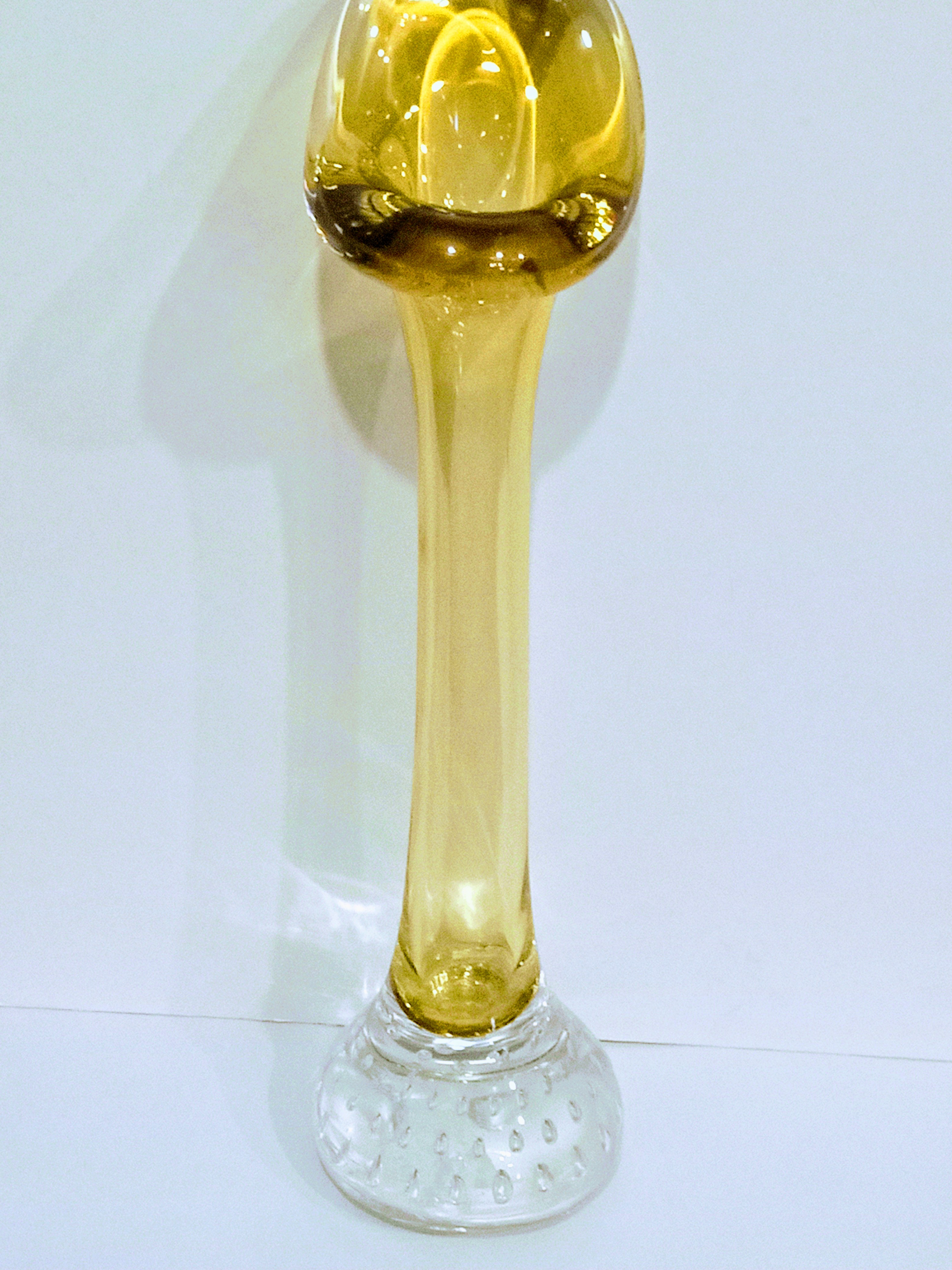 Yellow bud vase with clear controlled bubble base