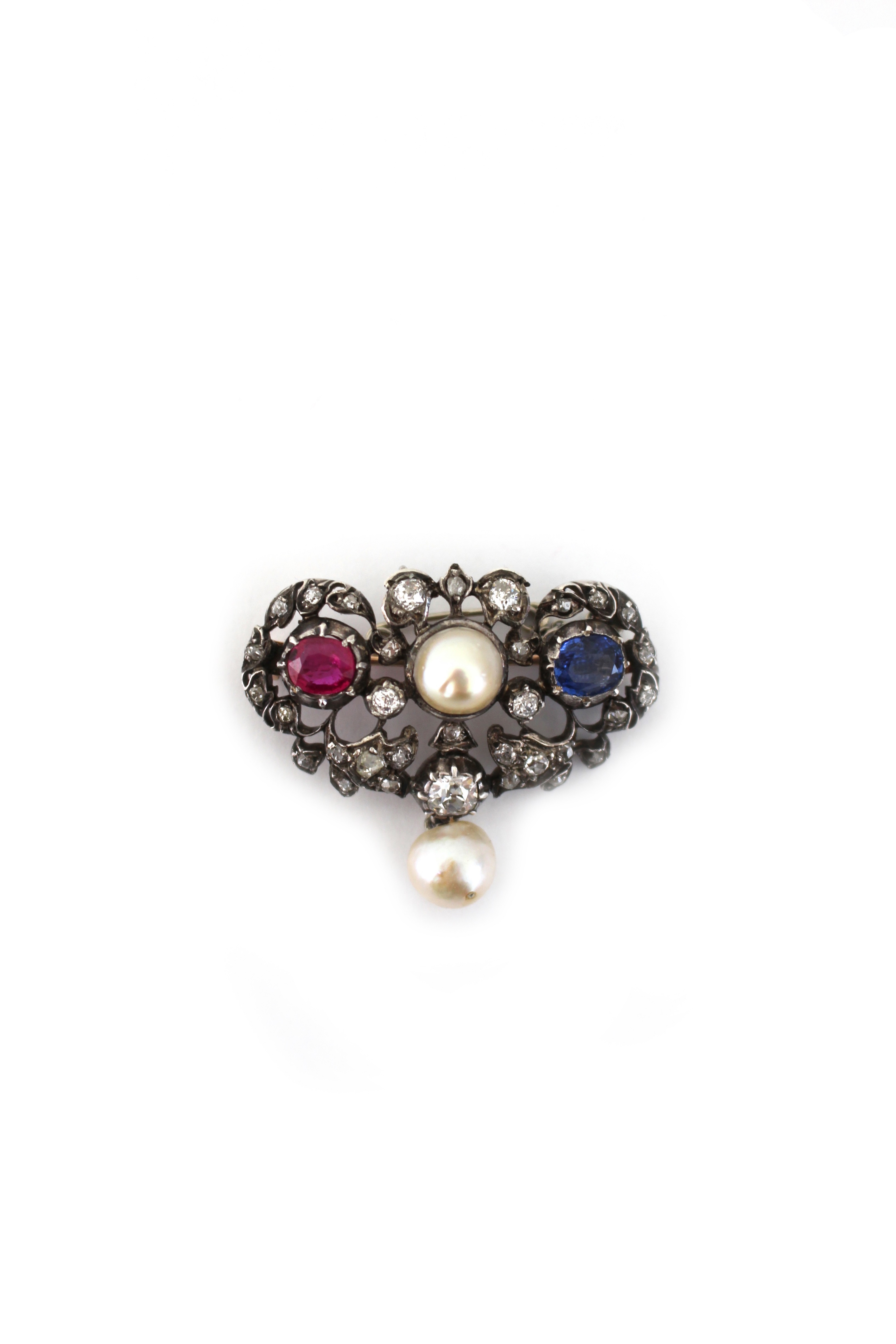 Circa 1900s Diamond Brooch with Ruby, Sapphire and pearls. 